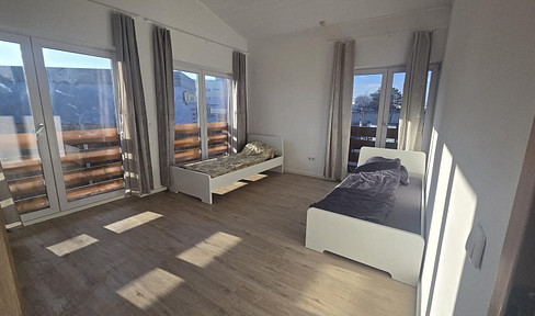 Detached apartment building with 6 residential units, accommodation for fitters, partial letting possible