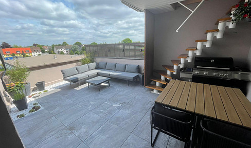 Light-flooded maisonette apartment with roof terrace