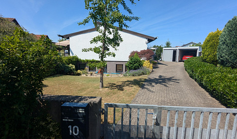 Einfamilienhaus mit Einliegerwohnung und großem Garten in ruhiger Lage