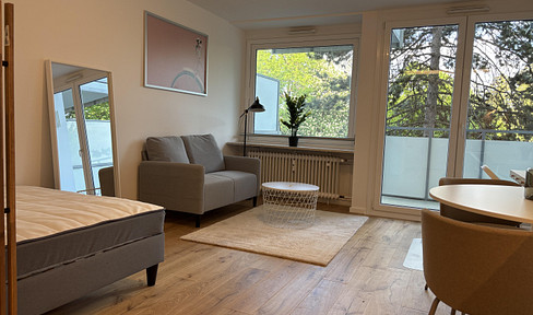 Exklusive 1-Zimmer-Wohnung mit Balkon & Hallenbad in Bogenhausen
