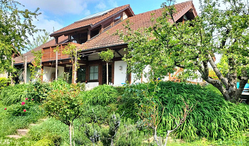 Holzhaus mit Kachelofen zu verkaufen