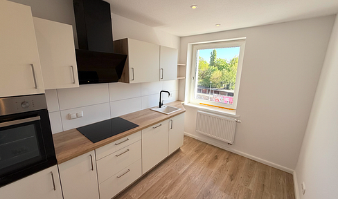 FIRST MOVING IN - New, bright & modern, 4-room (87m²) + EBK, south-west-facing balcony & excellent public transport connections