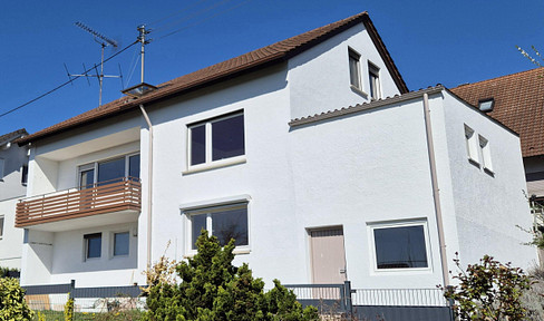 4 rooms on two levels in a panoramic location with garden and balcony in a semi-detached house