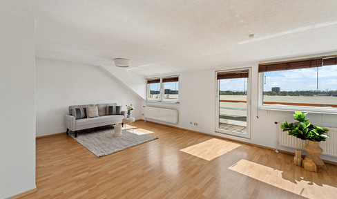 Attraktive 2,5-Zimmer-Wohnung im Dachgeschoss mit Weitblick |