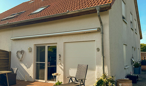 Charmante Doppelhaushälfte mit schönem Garten in ruhiger Lage