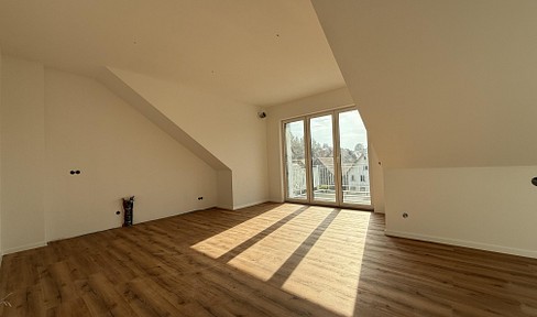 New-build standard 3-room attic apartment 66 m² with kitchen, balcony & parking space in Friesenheim!