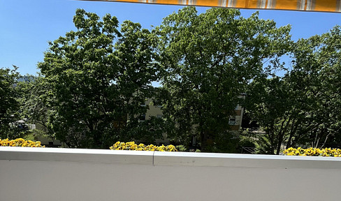 Modern living ambience with a green view - top-renovated first-time-occupancy apartment