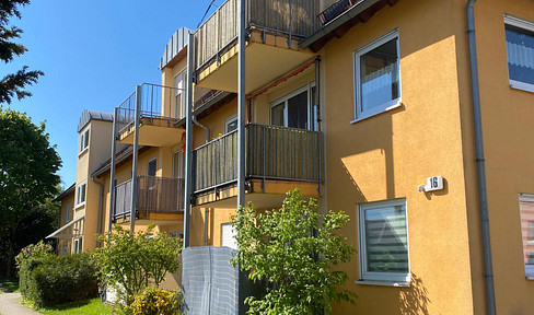 Moderne Dachgeschosswohnung mit Balkon