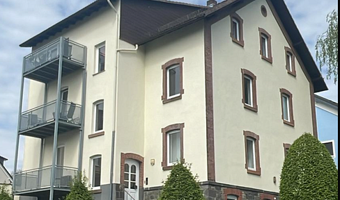 Charming top-floor apartment with balcony, fireplace and far-reaching views in the heart of Lich