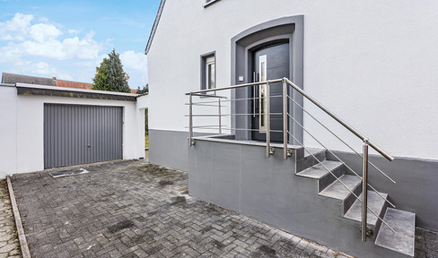 Modernisierte Doppelhaushälfte in begehrter Lage am Hülser Bruch – mit großzügigem Garten und Garage