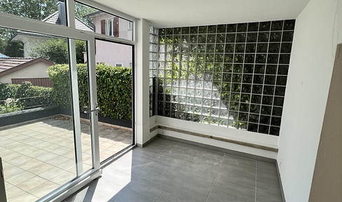3-Zi.-Wohnung mit Wintergarten, Kamin, großem Lager Terrasse, Gemeinschaftsgarten & Hobbyraum im UG