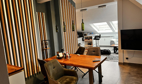 Attractive furnished 2-room top floor apartment with lux. Interior incl. TG and cellar