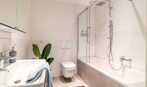 5,3% Rendite - neu modernisiert & vermietet, Wohntraum mit EBK, Wellness-Bad & Stellplatz, Bestlage