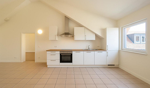 80 m² Loft-Wohnung mit Carport & Gartenanteil – Ruhige Lage mit exellenter Anbindung