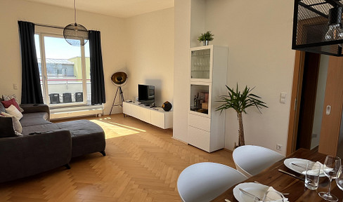 Modern 3-room apartment with loft character and roof terrace