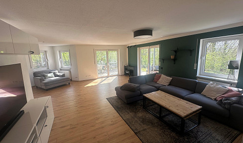 Impressive retreat in a fantastic location with five bedrooms, three bathrooms and a private garden