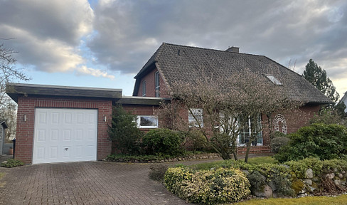 Einfamilienhaus mit gepflegtem Garten in unverbauter Südlage