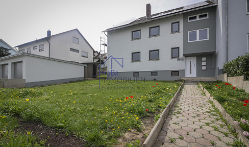 Charmante 4-Zimmerwohnung im ersten Obergeschoss mit Balkon und Gartenanteil