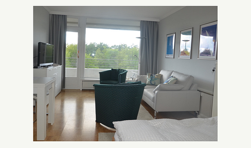 Sunny balcony with views of the forest and sea - directly from the private balcony