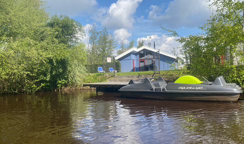 Vacation home by the lake, pedal boat, sauna, whirlpool, fireplace near the riding stables + play paradise