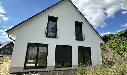 Modern single-family house in Rees (solid construction).