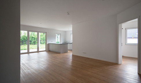 Wohnen im Neubau - Schwellenlose Erdgeschosswohnung mit Terrasse und Garten