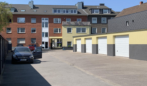 Warehouse storage space with 5 electric roller doors, heating if required, in the middle of Bottrop near the city park