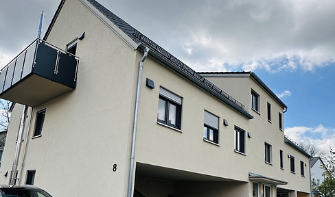 Moderne 2-Zimmer-Erdgeschoss-Wohnung mit großzügigem Garten und gemütlicher Terrasse