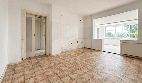 Family-friendly terraced house with garden, conservatory & garage in a quiet location in Kitzscher