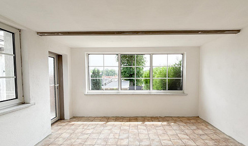 Family-friendly terraced house with garden, conservatory & garage in a quiet location in Kitzscher