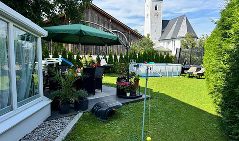 Attractive 4-room garden apartment with double garage