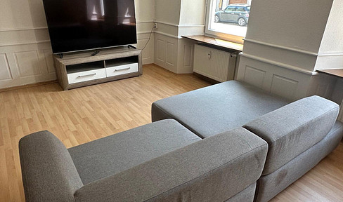 Renovated, furnished 3-room apartment in an old building right in the center