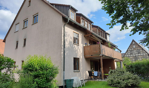 3-room apartment in a great, quiet location - with 128m² private garden, hobby room and garage - rented out