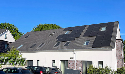 Green family happiness: KFW 40 architect-designed mid-terraced house with PV system and dream garden