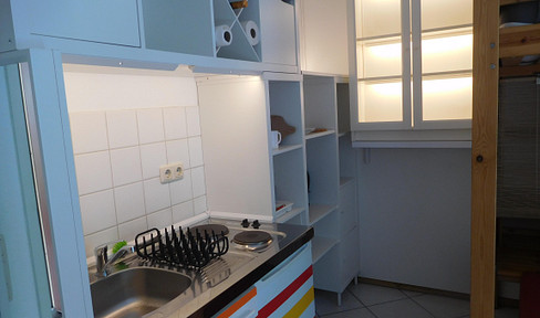 Möblierte 1-Raum-EG-Wohnung barrierefrei mit Tiefgaragenplatz