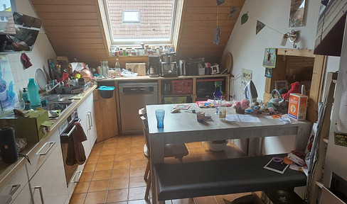 Attic apartment with wood-burning stove