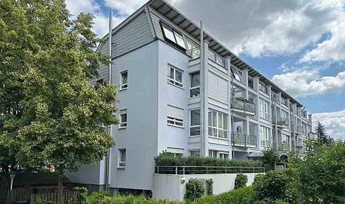 Stylish, well-kept 3-room apartment with balcony including underground parking space