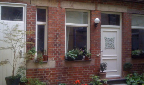 Centrally located rear building