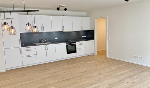 New build in a dream location: Exclusive 2-room apartment directly on the Auer Mühlbach stream