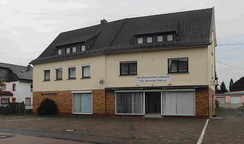 Large detached house with store and rear building with lots of potential