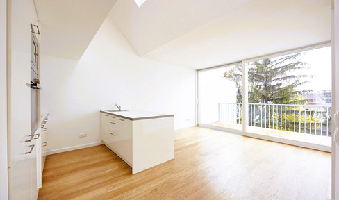 Stylish top floor apartment for sale