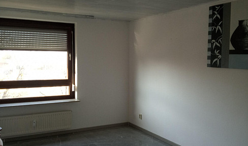 Practical 4.5 room apartment with balcony and garage