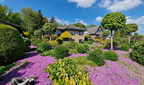Exklusiver Walmdachbungalow mit Wintergarten und traumhaft angelegter Gartenfläche - Maklerfrei!