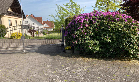 Quiet & newly renovated 2-room ground floor apartment with (new) EBK, own terrace on the edge of the forest