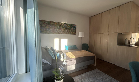 In Mitte: Bright studio apartment in modern building with numerous services