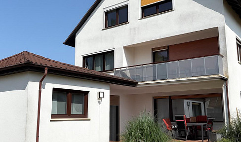 Familienfreundliches Wohnen mit Stil: 4-Zimmer-Erdgeschosswohnung Butzbach-Nieder-Weisel