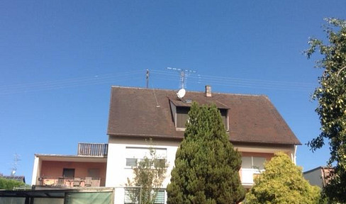 Bright and spacious 4-room attic apartment with two balconies.