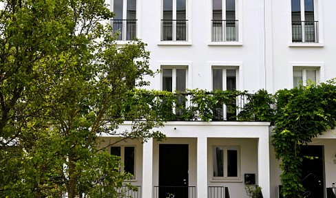 Modern, exclusive townhouse, dreamlike living by the park in the Swiss Garden in Berlin's Mitte district