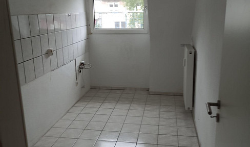 Two-room apartment on the ground floor with a private garden area.