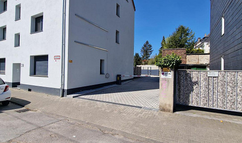 Modern garage courtyard with smart features (video surveillance / with electronic barrier)